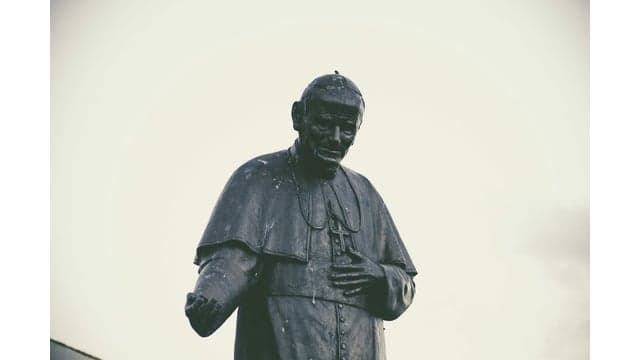 Persuasion: A Case Study of Papal Influences on Fertility-Related Beliefs and Behavior